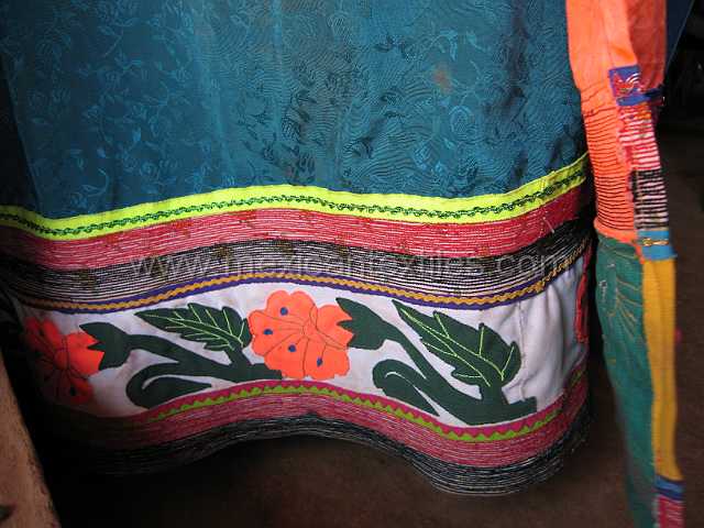 cora_skirt.JPG - The styles keep chenging , here the applica'e flowers are in style.