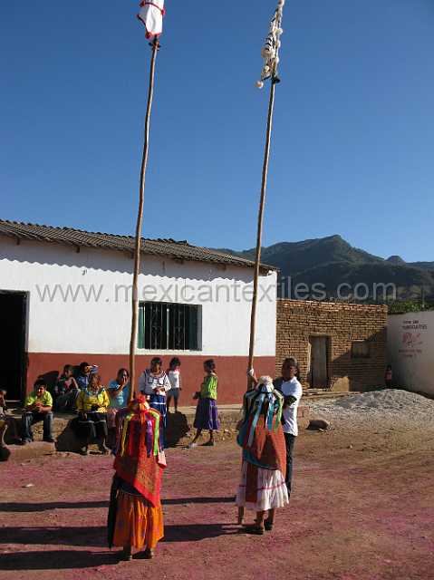 cora_ceremony_06.JPG - Malinches in front of the ceremonial center.