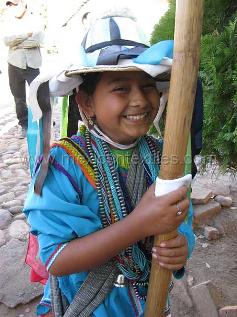 cora_ceremony_10.JPG - The second malinche is coaxed into a smile.