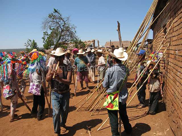 cora_men_10.JPG - Flutes and drum sound day and night during the festival.