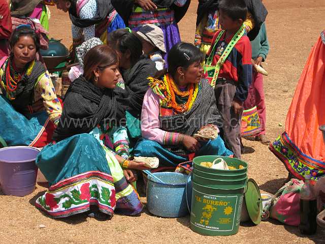 cora_women_15.JPG - Wives of the Capitans and Centurions preparing to feed to people at the festival.