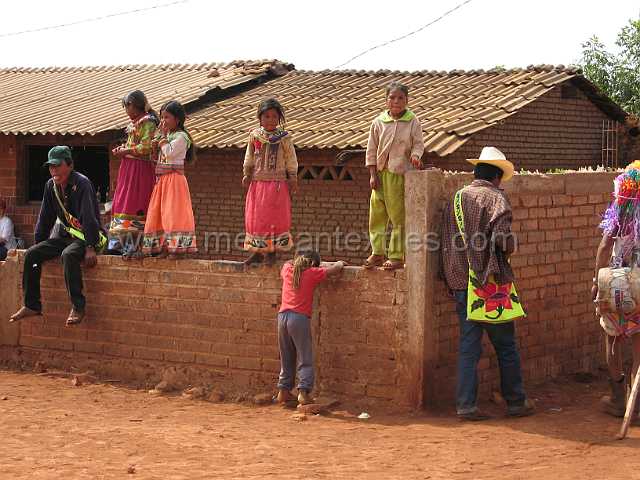 fiesta_02.JPG - Staying out of harms way , these young Cora watch the fighting from a safe distance.
