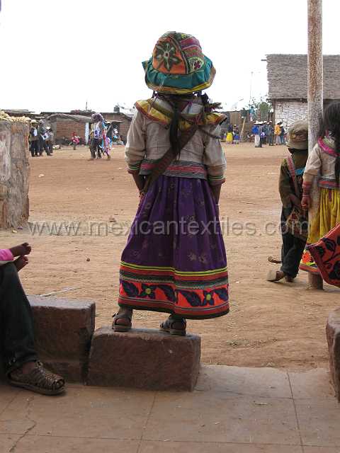 fiesta_04.JPG - A young Cora girl wearing traditional costume and those