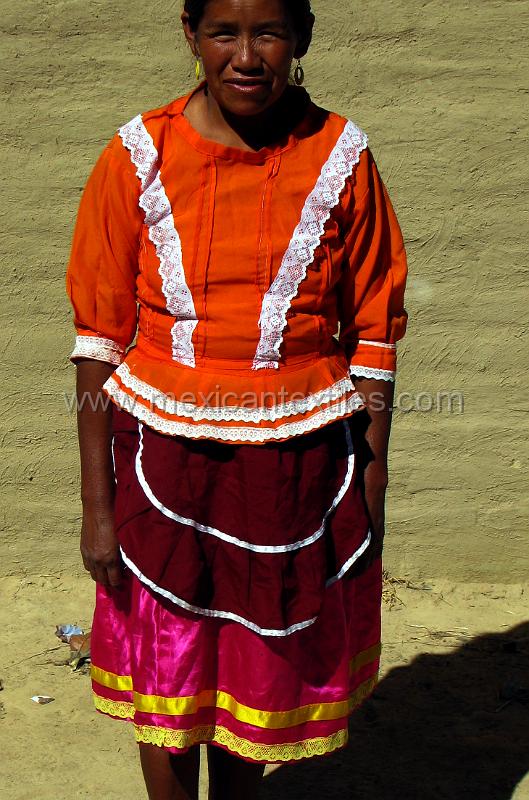 tepehuano_woman_05.JPG - Documentation of tepehuano indigenous textiles from Huajicori, Nayarit, Mexico. After visiting Mesa de los Ricos we ran into a man on the road , our guide spoke with him and he told us his wife wore traditional costume. So off we went for a small dirt road to the town of La Higera.