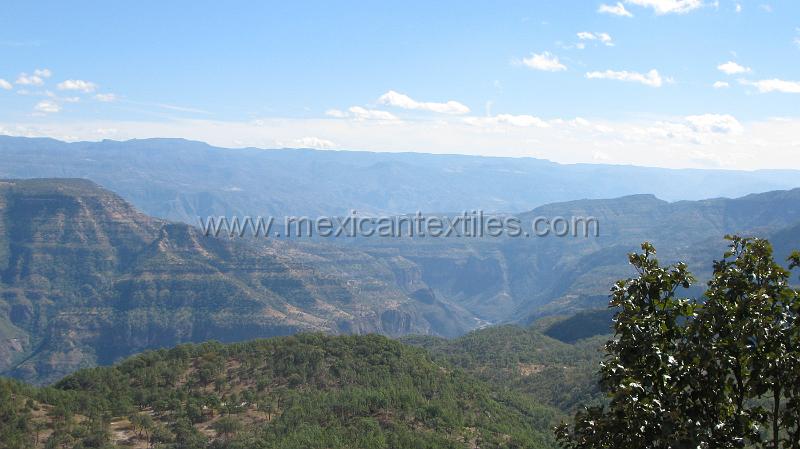 To_limonal.JPG - Documentation of tepehuano indigenous textiles from Huajicori, Nayarit, Mexico. She had to ross this canyon to get where we took he picture.