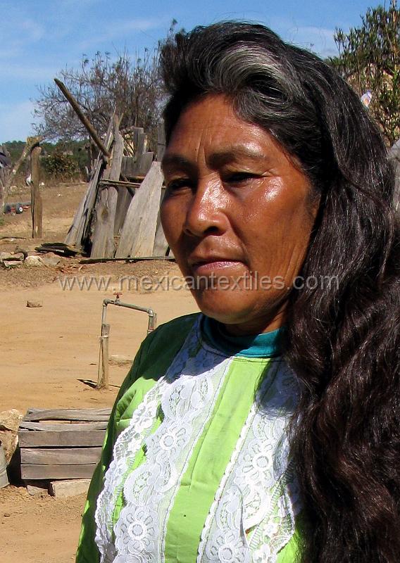 1Tepehuano_woman_01.jpg - Documentation of tepehuano indigenous textiles from Huajicori, Nayarit, Mexico. Costume is almost extinct in this small hamlet. However we found one women who continues to wear  her costume.