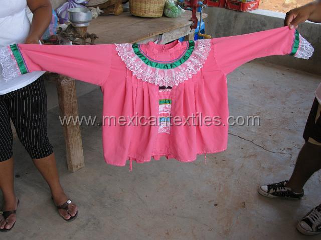 ahuelican_nahuatl17.JPG - Over blouse from Ahuelican, this blouse in made from synthetic material , but hangs loose.
