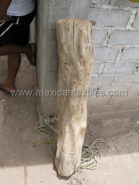 nahuatl_ostiapan09.JPG - Our friend is saving this last piece of wood he has available to make masks. It has to dry various years.