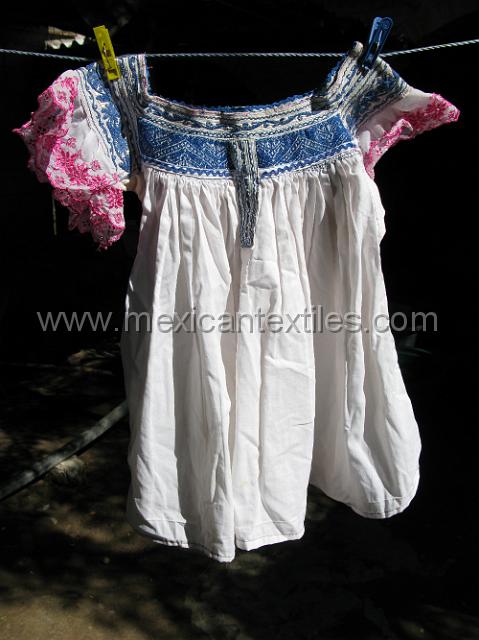 oapan_nahuatl28.JPG - hanging the blouse to take a better look.