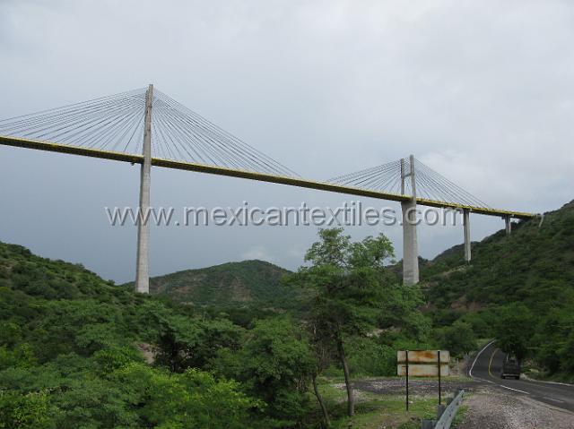 cozomatlan_nahua04.JPG - A veiw of the bridge over the Rio Balasas from the new road that finally was built to get to These isolated villages.The road above is the super highway to Acapulco.  Most of this work was done after the old political party that had been in power for 70 years was replaced with the left leaning PRD. (photo 2009)