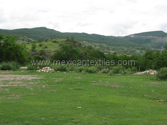 cozomatlan_nahua30.JPG - This is a view across the river , which is below, the road on the upper right is the Autopista ( super highway to Acaplulco.