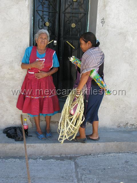 totolzintla_nahuatl04.JPG - San Juan Totolzintla is at the end of the road on the south side of the Rio Balsas. A new bridge and paved road some miles before the town now allows easier access to the villlage. Essencially traditional costume has disapeared from the town and a style of peasant wear has replaced it.