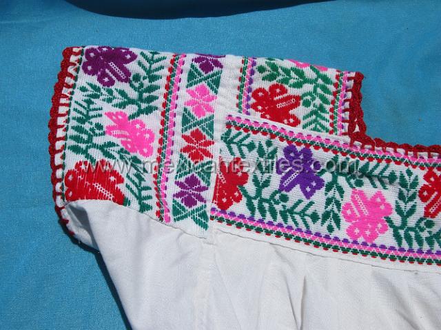 nahuatl_hueytentan_07.JPG - details of hand embroidered blouse from Cuautempan.