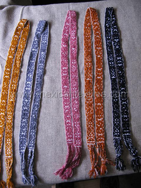 nahua_hueyapan_02.JPG - The back strap woven belt are and intergal part of the traditional costume. These examples are solid colors but I have also seen two color belts as well.