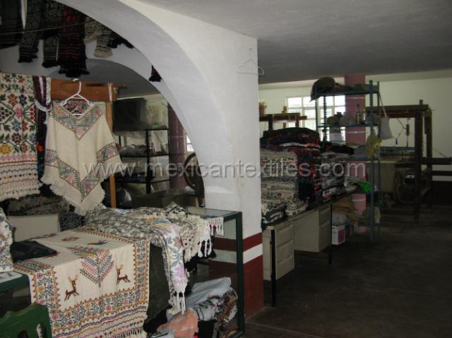 nahua_hueyapan_23.JPG - Inside the Textile collective , the Spanish looms are in the background.
