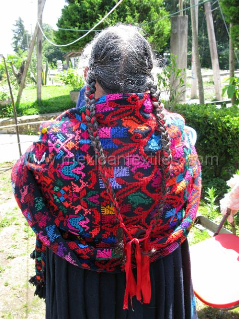 nahua_hueyapan_37.JPG - Traditional shawl and ribbons in her hair tied off with the ribbon.