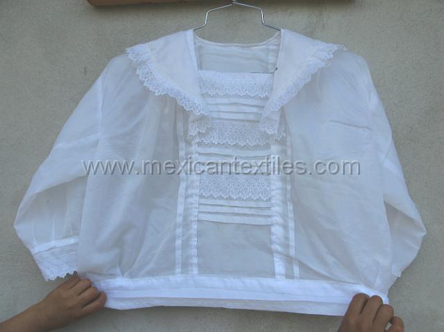 nahua_hueyapan_43.JPG - This is a traditional Over blouse still used by at least two generations.