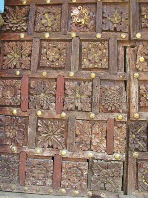 1cburch_carved_door.JPG - This is the front door to the church, with the wonderful wood carvings.