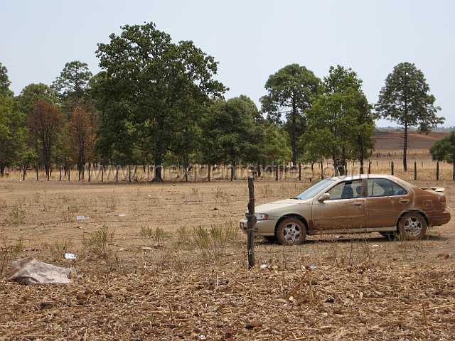 cora_pastor_13.JPG - My poor car after the battering trip into Santa Teresa, no one believe that that car made it. What they didn't know was it had a steel plate underneath and was jacked up 2 inches and had oversized tires.