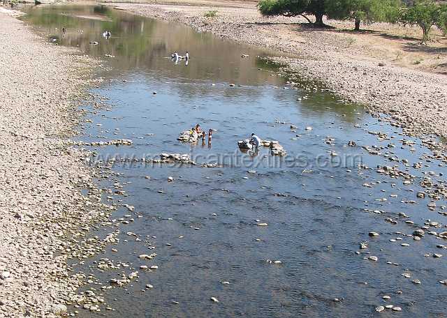 cora_river.jpg - The river where people wash clothes and bath.