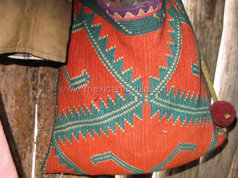 tepehuano_bags_01.JPG - Documentation of tepehuano indigenous textiles from Huajicori, Nayarit, Mexico. The homes are filled with bags hanging like wonderful treasures. Here are some examples of woven and net bags.