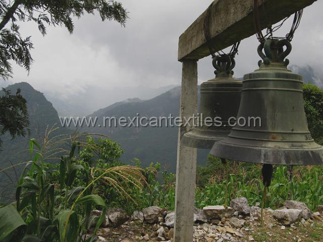 aguacatitla_mazateca_28.JPG - Church bells with the Sierra Norte mountains behind them.